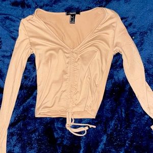 I am selling a blouse from forever 21 that has a nice material for women.
